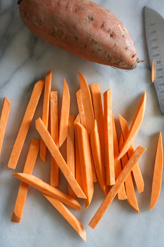 Crispy sweet potato fries made in the air-fryer, with just a small amount of oil! Making them in the air fryer is so much healthier than frying, and reduces the fat and calories, without sacrificing taste.