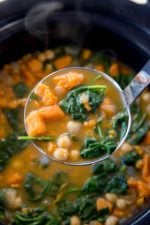 Slow Cooker Chickpea Sweet Potato Stew with warm flavors from cumin, coriander and cinnamon is the perfect winter stew you’ll eat all season long.