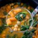 Slow Cooker Chickpea Sweet Potato Stew with warm flavors from cumin, coriander and cinnamon is the perfect winter stew you’ll eat all season long.
