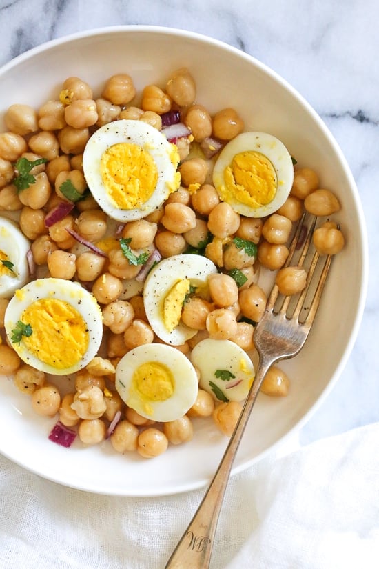 This easy chickpea and egg salad is so simple and delicious for lunch (or breakfast!). It's inexpensive to make, high in protein and fiber and great to make ahead for the week.