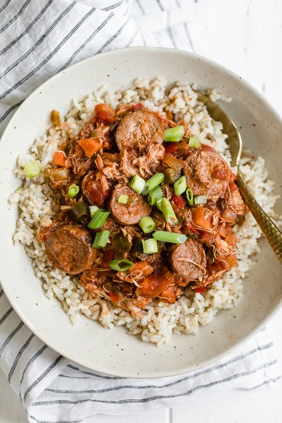 This New Orleans-inspired slow-cooker dish with chicken and Andouille sausage simmered in a rich tomato broth, is perfect to make for Fat Tuesday!