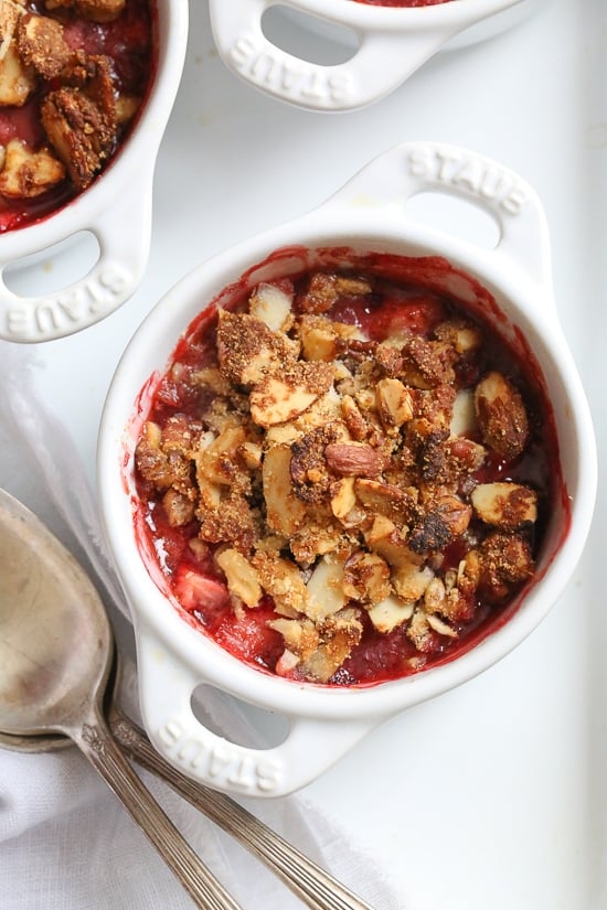 These individual gluten-free strawberry crisps are topped with a crisp nutty topping using a combination of almonds, walnuts and pecans.