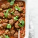 Moroccan Kefta Meatballs made with tomatoes and olives are simmered together in the slow cooker or Instant Pot in this easy and exotic Moroccan dinner. Whole30, gluten-free and Paleo.
