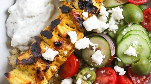 Smoky yogurt-marinated grilled chicken served over quinoa and Mediterranean-inspired tomatoes, cucumbers, and olives with tzatziki and Feta.