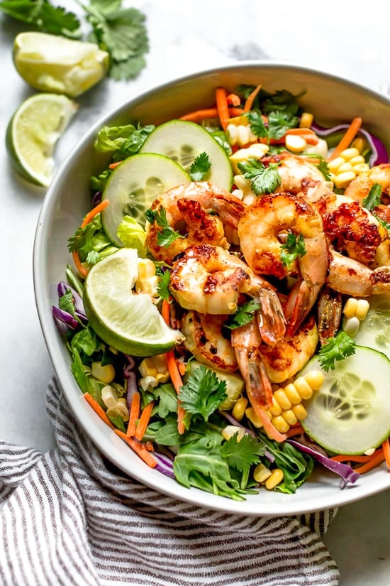 This refreshing Thai-style salad with greens, herbs, veggies and shrimp, all tossed in a delicious cashew dressing, is the perfect one-dish summer dinner.