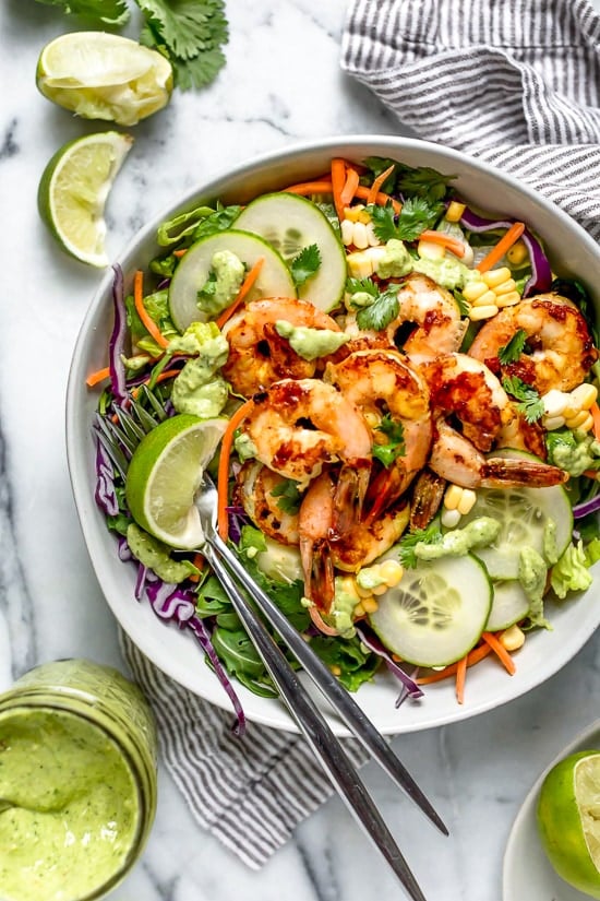 This refreshing Thai-style salad with greens, herbs, veggies and shrimp, all tossed in a delicious cashew dressing, is the perfect one-dish summer dinner.