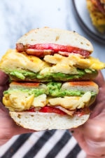Bacon, egg and avocado on a bagel is my favorite breakfast sandwich made with scrambled eggs, center cut bacon and sliced tomatoes on my homemade bagels.