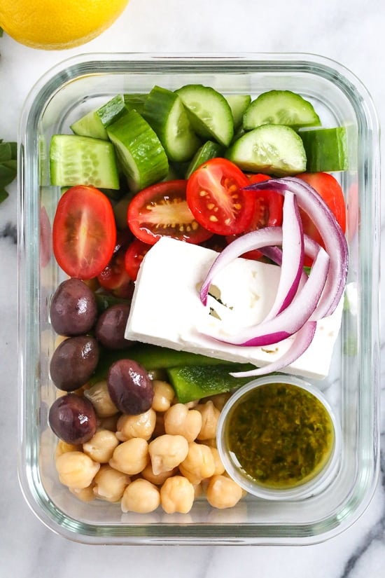 Greek Chickpea Salad, made with chickpeas, cucumbers, tomatoes, bell peppers, olives and Feta is perfect to make ahead, for lunch for the week!