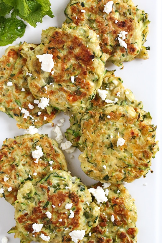 Zucchini and Feta Fritters, a fabulous summer side dish to make great use of in-season zucchini and mint.