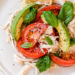 This quick and easy chicken salad is made with the breast meat of a Rotisserie chicken, avocados, fresh tomatoes, basil and lemon juice.