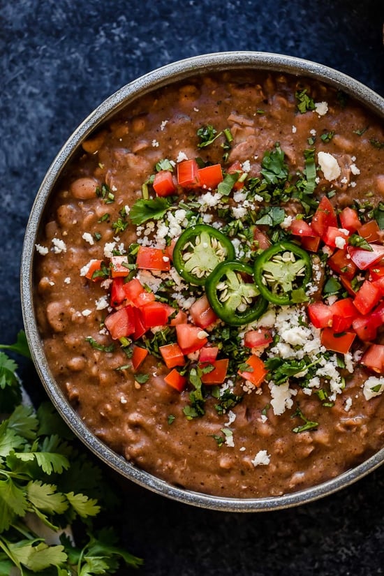 If you love the flavor of refried beans but would rather avoid the lard they are typically cooked in, you’ll love this easy, fat-free version made in the Instant Pot.