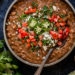 If you love the flavor of refried beans but would rather avoid the lard they are typically cooked in, you’ll love this easy, fat-free version made in the Instant Pot.