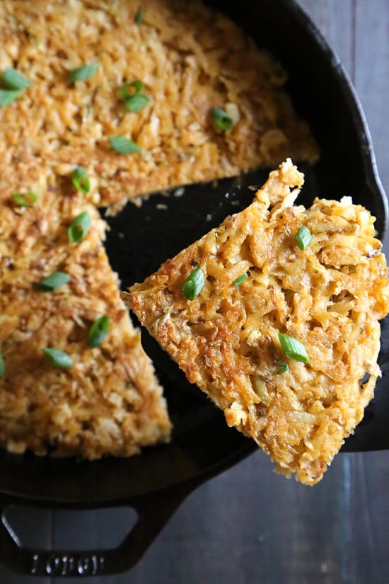 These crisp, perfectly cooked hash browns are made in a skillet, with shredded potatoes, scallions and seasoning for the perfect breakfast side dish to go with your morning eggs.