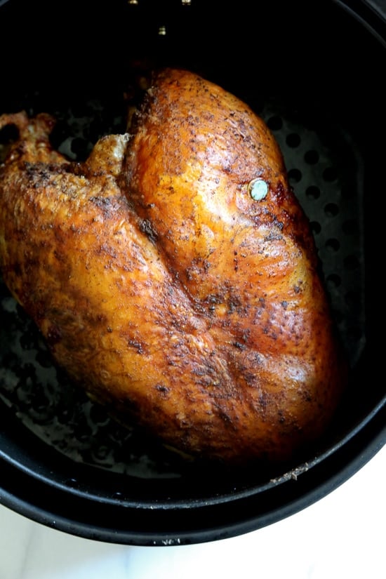 Roasting a turkey breast in the air fryer yields perfectly cooked, moist and juicy meat on the inside with a beautiful deep golden brown skin.