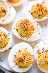 When it comes to making deviled eggs, I keep my ingredients pretty classic, but I love adding little pickle juice to my the yolks for a pop of flavor! Making hard boiled eggs in the Instant Pot will give you perfect, easier to peel eggs every time.