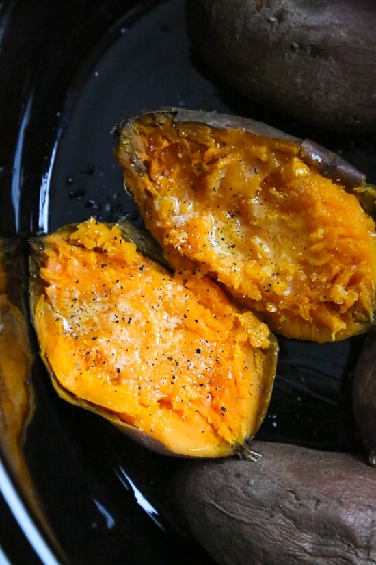 The easiest and my way favorite way to make baked sweet potatoes are in the slow cooker rather than the oven! Not only does your house smell amazing while they cook, they come out moist and delicious every time.