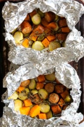 An easy Fall foil packet dinner made with spicy chicken Andouille sausage, Brussels sprouts and butternut squash. It's the perfect balance of spicy, smokey and sweet in every bite!
