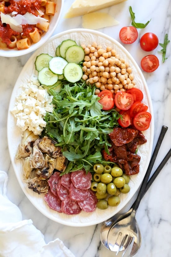 For fuss free entertaining, nothing is easier (and prettier) than creating an antipasto salad platter!
