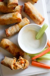 These Buffalo Chicken Egg Rolls, filled with shredded boneless chicken breast, carrots, scallions, hot sauce and blue cheese make the perfect appetizer! Bake them in the oven or air fryer!