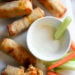 These Buffalo Chicken Egg Rolls, filled with shredded boneless chicken breast, carrots, scallions, hot sauce and blue cheese make the perfect appetizer! Bake them in the oven or air fryer!