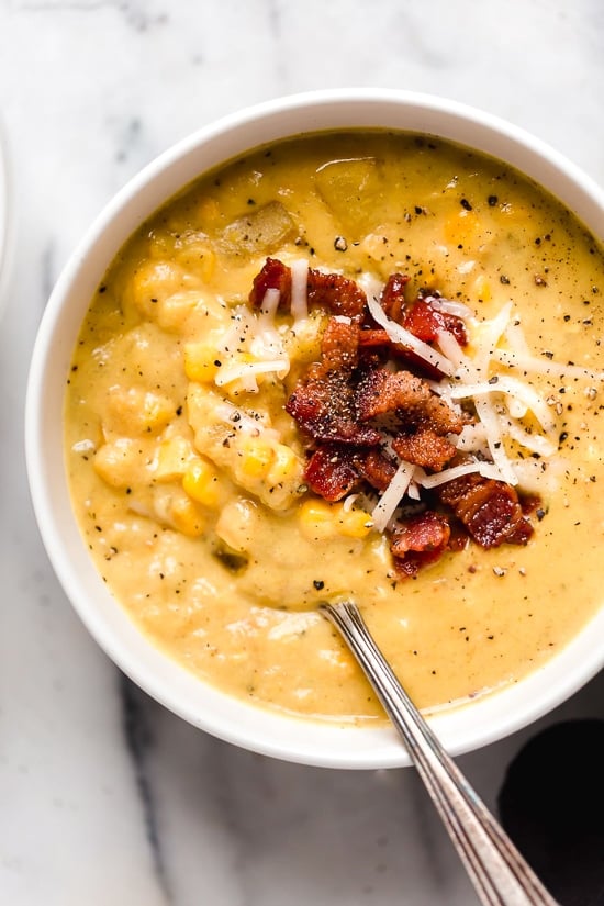This thick and cheesy chowder with potatoes, corn, cauliflower, and bacon is perfect for cold and cozy winter nights.