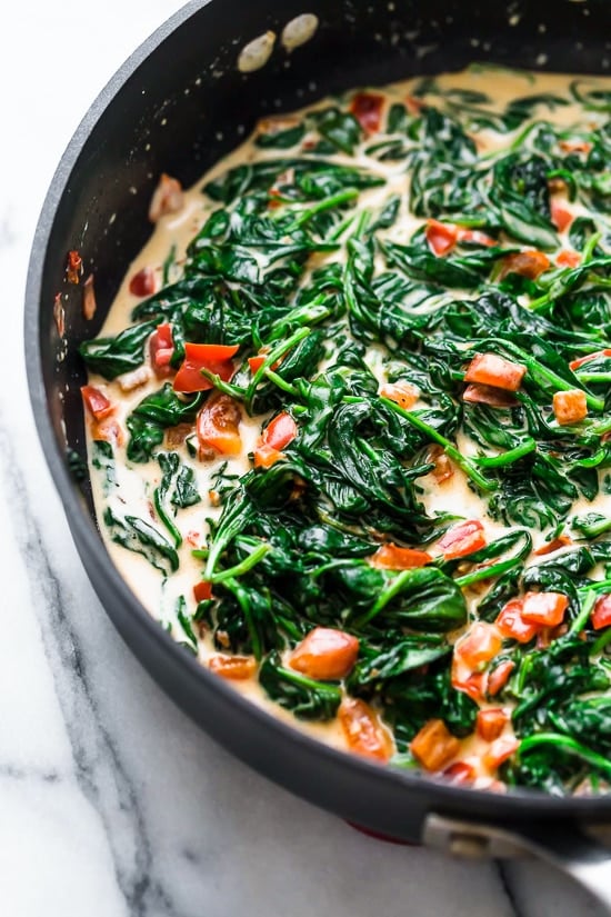 This easy Fish Florentine recipe, made with a pan seared firm white fish served on a creamy bed of spinach feels like something you would order out in a fancy restaurant!
