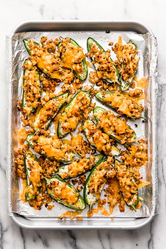 Jalapeno Poppers meet nachos in this fun, low-carb twist of two classic appetizers, perfect for sharing!
