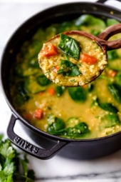 Red Lentil Soup with Spinach is a delicious, Middle Eastern inspired Lentil Soup, made with red lentils, turmeric, spinach, carrots and lemon. It's golden in color, and very easy to make and leftovers are freezer-friendly.