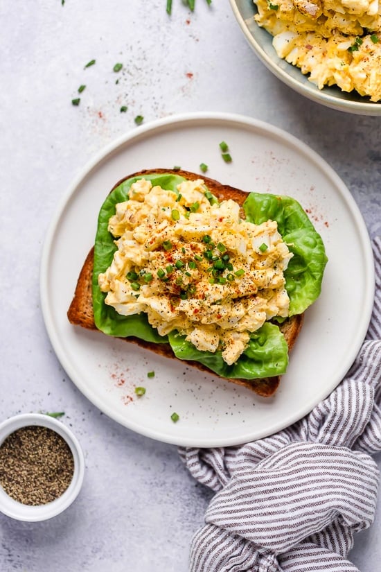 This classic egg salad recipe can be enjoyed for breakfast on toast, or for lunch in a wrap, over salad or in a sandwich. Sometimes I just eat it with a spoon right out of the container!