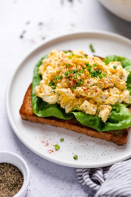 This classic egg salad recipe can be enjoyed for breakfast on toast, or for lunch in a wrap, over salad or in a sandwich. Sometimes I just eat it with a spoon right out of the container!
