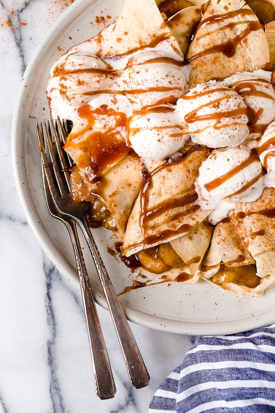Banana Foster Crepes combine two of my favorite desserts – homemade crepes and bananas fosters! This slimmed down make-over is delicious and perfect anytime you're craving something sweet!