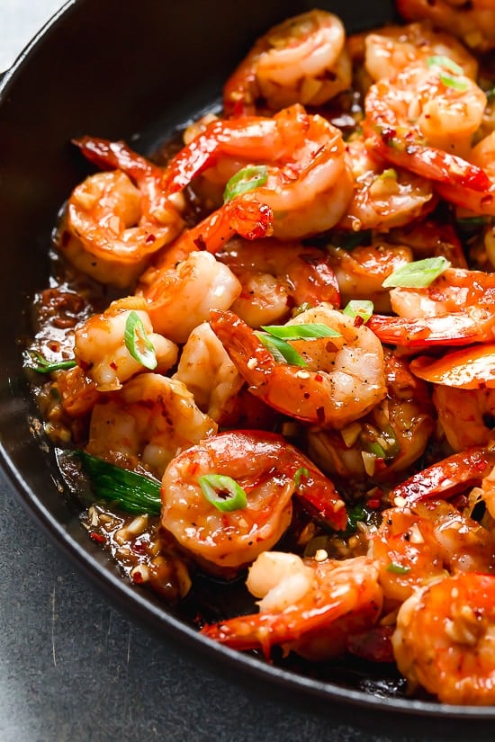 For a quick and easy weeknight stir-fry, you will love this Asian honey garlic shrimp recipe! It's sweet, spicy, savory, and so good!!
