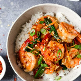 For a quick and easy weeknight stir-fry, you will love this Asian honey garlic shrimp recipe! It's sweet, spicy, savory, and so good!!