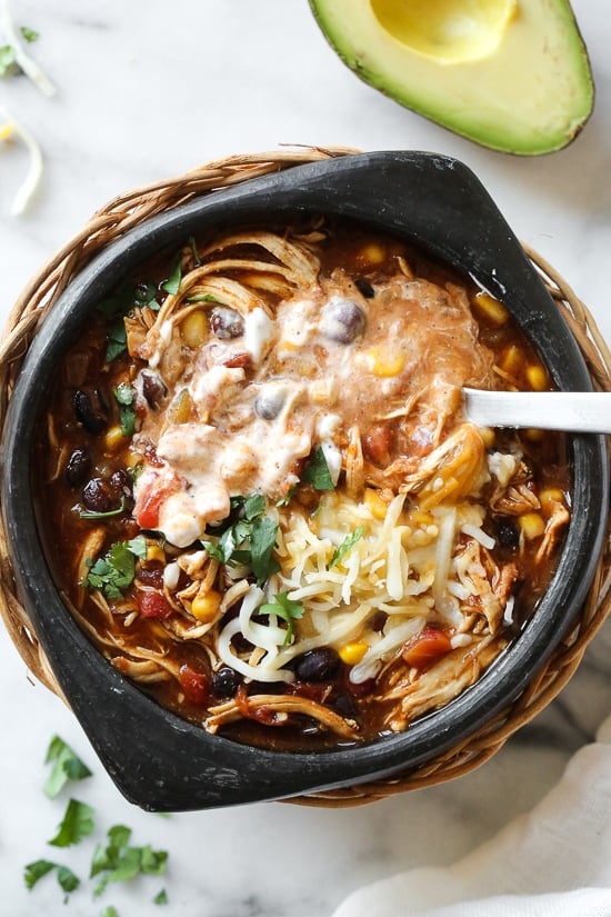 A bowl of Instant Pot chicken chili topped with cheese