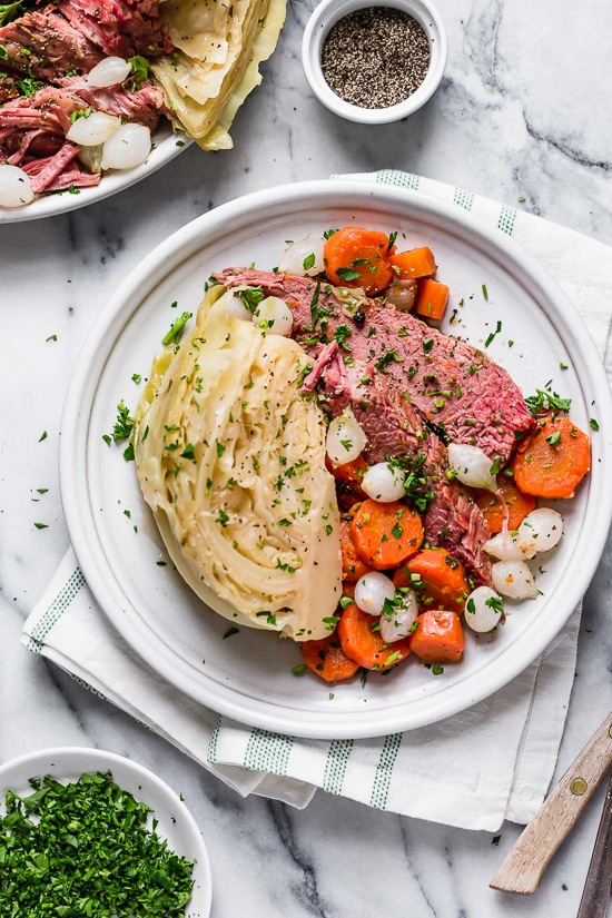 This easy Instant Pot Corned Beef and Cabbage recipe, made with beef brisket, cabbage and carrots comes out so tender and delicious! Perfect for St Patrick's Day!