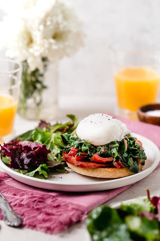 I love this lighter take on Eggs Benedict made with Canadian bacon, Swiss chard and poached eggs on a whole wheat English muffin. Perfect for breakfast or brunch!