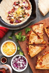 These BBQ Chicken Quesadillas are a fun twist on traditional quesadillas. Made with chicken breast, BBQ sauce, cheese, red onion and cilantro on a high fiber whole wheat tortilla.