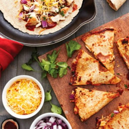 These BBQ Chicken Quesadillas are a fun twist on traditional quesadillas. Made with chicken breast, BBQ sauce, cheese, red onion and cilantro on a high fiber whole wheat tortilla.