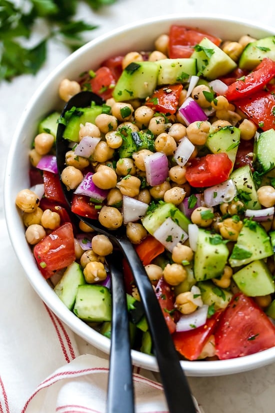 This healthy, summer Chickpea Salad with cucumbers and tomatoes is great for lunch or as a side dish with anything you're grilling!