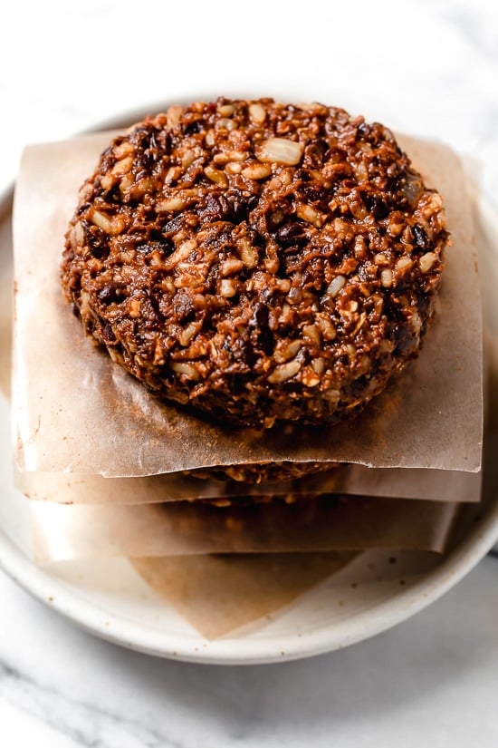 This is a black bean burger that even hearty meat-eaters will love! Made with beans, oats, brown rice, beets and a whole lot of spices, this veggie burger is a real crowd pleaser. Keep them in the freezer to eat thoughout the month.
