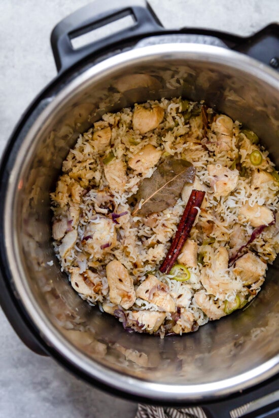 Chicken pulao ingredients in an Instant Pot