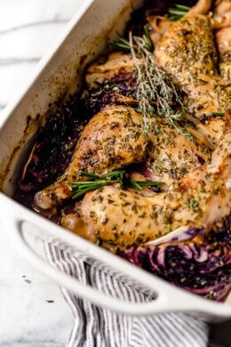 Baked Apple Cider Chicken and Cabbage is the perfect one-pot fall dish made with cider-marinated chicken, red cabbage and apples.