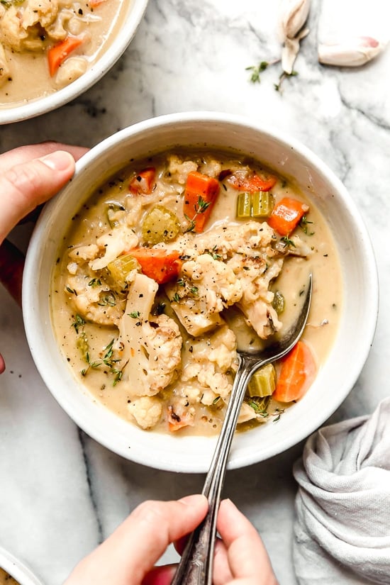 This Creamy Roasted Cauliflower Chowder is comfort food without all the calories. Made with roasted cauliflower, which adds deep, caramelized flavor while keeping the soup a little lighter.