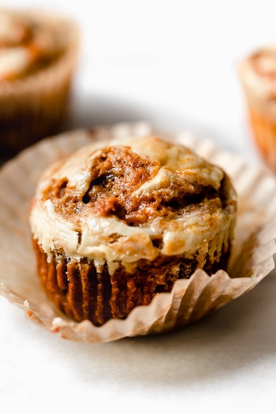 Pumpkin Cream Cheese Muffins are moist delicious and perfectly spiced A delicious fall breakfast treat made with canned pumpkin pumpkin spice and a cream cheese swirl topping TeamJiX