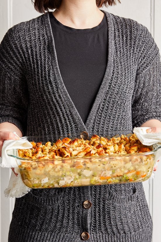 Turkey Pot Pie with Stuffing Crust is a fun twist on a turkey pot pie which is made with chopped turkey and veggies simmered in a creamy sauce  finished with a stuffing topping.