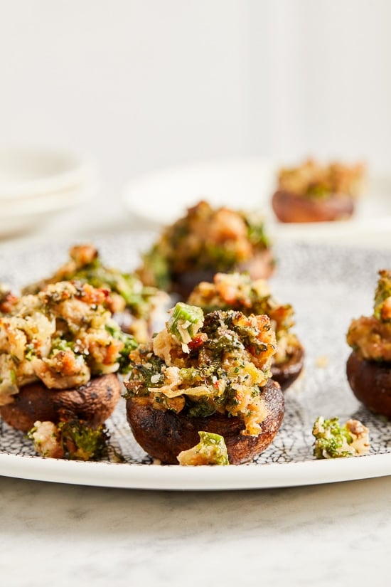 I'm OBSESSED with these Italian stuffed mushrooms filled with broccoli rabe and sausage, the perfect festive holiday appetizer!