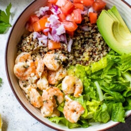 These quick and easy Lemon-Chili Shrimp Avocado Quinoa Bowls are great for lunch or dinner, or make them ahead for meal prep!
