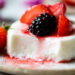This simple Yogurt Panna Cotta is the perfect smooth, creamy dessert. The cool tang of yogurt pairs perfectly with fresh berries. To macerate the berries simple mix them with a little sugar and let them sit.