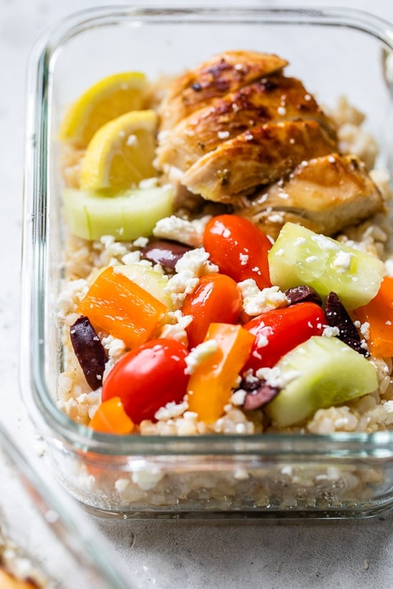Bring the flavors of the Mediterranean to work with these Greek Chicken Meal Prep Rice Bowls – the perfect recipe to make ahead!