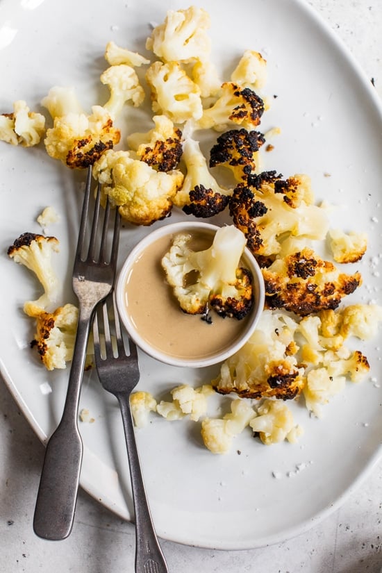 This simple, Whole Roasted Baby Cauliflower is perfectly charred on the outside and tender in the middle. Made with just four ingredients – salted water, extra-virgin olive oil, coarse sea salt—and cauliflower.